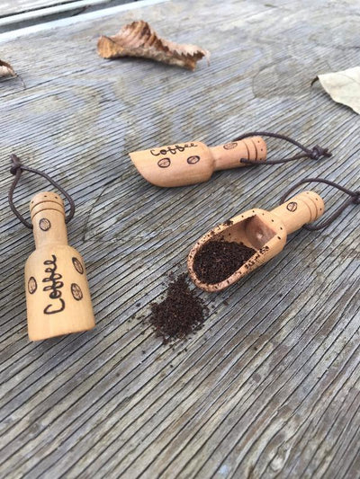 Small Coffee Scoops.  Each scoop has the word "coffee" surrounded by dots and coffee beans around the scoop that is wood burned by hand.  Small Coffee Spoons for your coffee bar accessories or coffee gifts.
