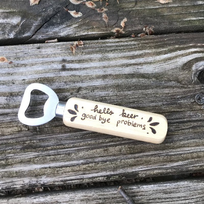 Stainless Steel Bottle Opener with Wooden Handle.  Handle has the quote "hello beer good bye problems" that is wood burned by hand.  Great bottle opener to keep in your kitchen or take on the go.  Beer Lover Gifts.