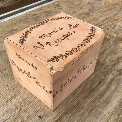 Handmade Wood Recipe Box.  Has quote "mom's recipes" with leaves/vines all around the box.  