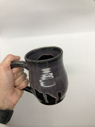 Halloween Coffee Mugs.  Handmade pottery mug with a black glaze and dark purple drippings