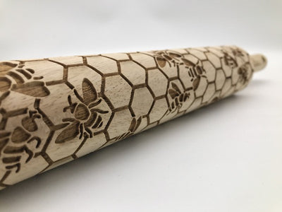 Wood Rolling Pin with bumblebee and honeycomb designs.  Make bumblebee cookies or pottery designs.