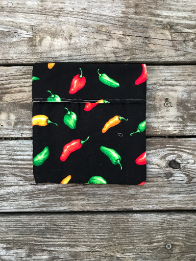 Handmade Black Potato Bag with Peppers Design.