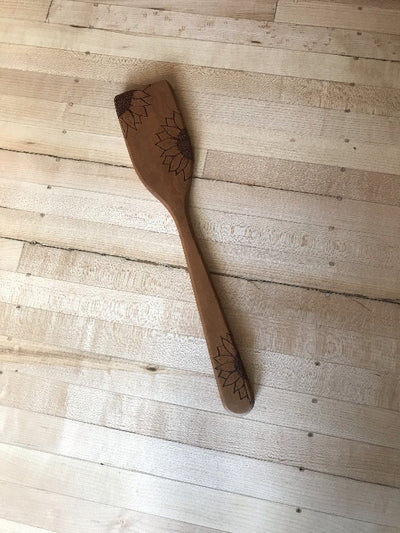Wooden Spatula with wood burned sunflower engraved all around.  Can be personalized along the handle.  Handmade kitchen gifts.