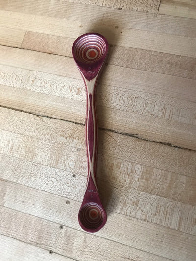 Red Pakka Wood Double Sided Measuring Spoon.  One teaspoon and one tablespoon.
