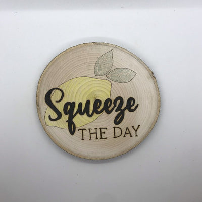 Squeeze the Day Lemon Kitchen Sign.  Wood burned sign with a yellow colored lemon behind the words.  Cute farmhouse kitchen gift.